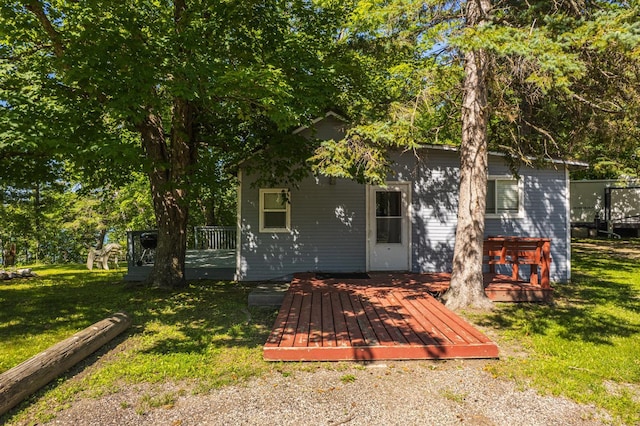 23546 Warbler Way Unit C1, Detroit Lakes, MN 56501 - back of house with a deck and a yard