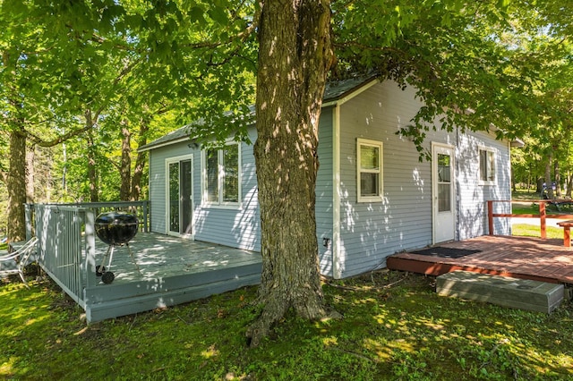 23546 Warbler Way Unit C1, Detroit Lakes, MN 56501 - back of house featuring a wooden deck