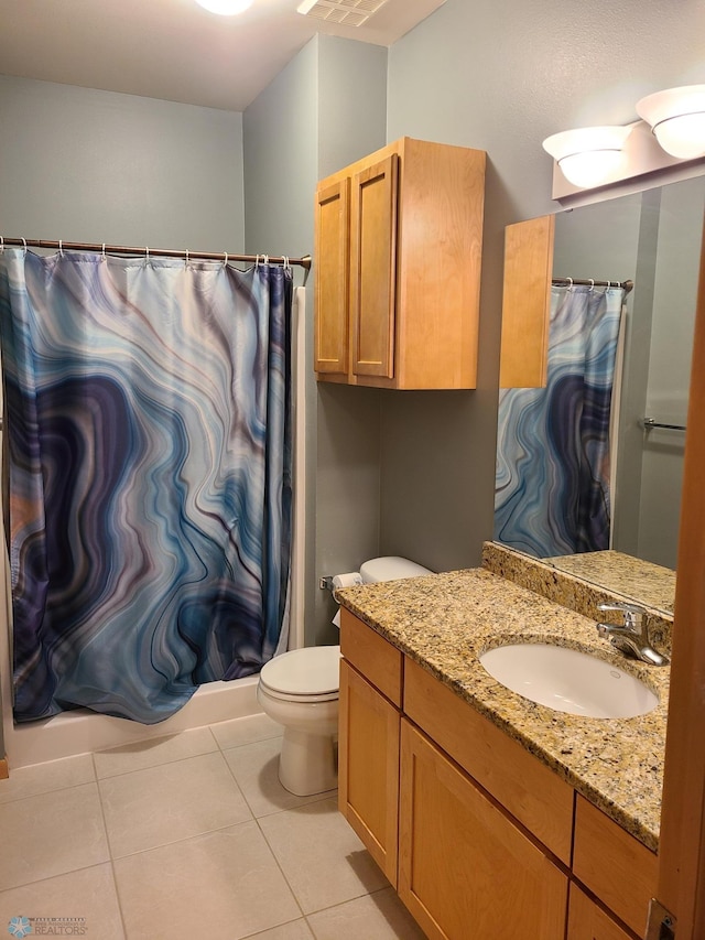 4394 46th Ave S Unit B, Fargo, ND 58104 - bathroom featuring vanity, tile patterned floors, and a shower with curtain