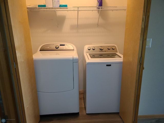 4394 46th Ave S Unit B, Fargo, ND 58104 - laundry room featuring separate washer and dryer and dark wood-style floors