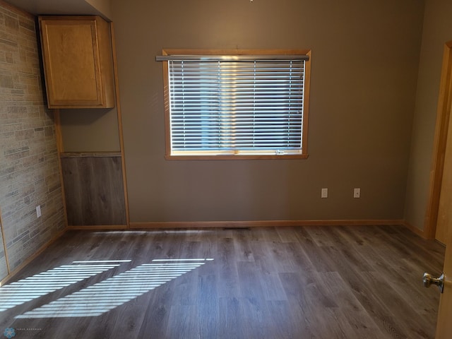 4394 46th Ave S Unit B, Fargo, ND 58104 - empty room featuring dark wood finished floors and baseboards