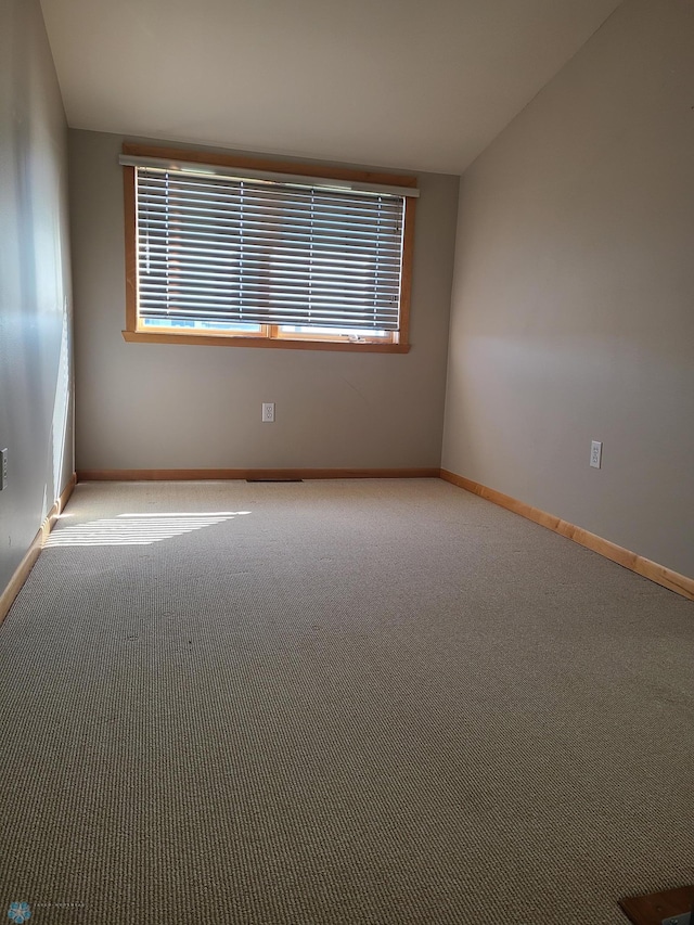 4394 46th Ave S Unit B, Fargo, ND 58104 - carpeted spare room featuring baseboards