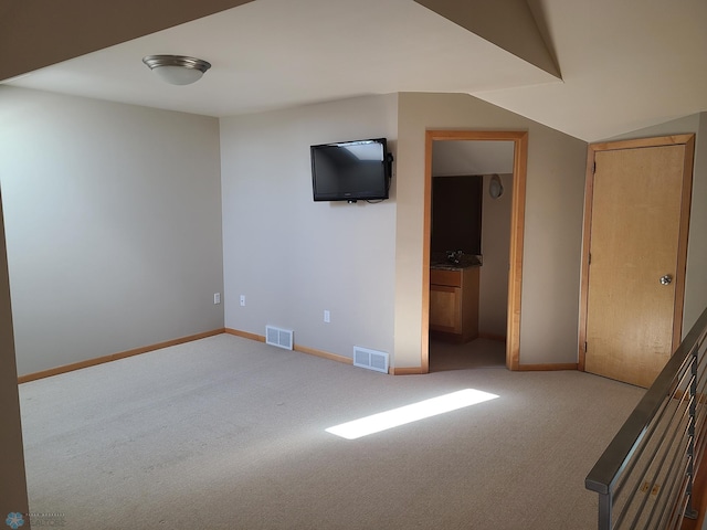 4394 46th Ave S Unit B, Fargo, ND 58104 - spare room featuring carpet floors