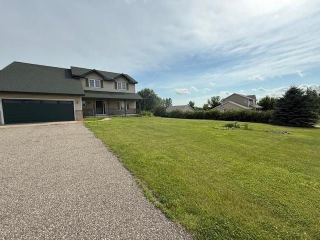 1355 Butterfly Ln, Spring Lake Twp, MN 55352 - view of front facade featuring a garage, a front lawn, and asphalt driveway
