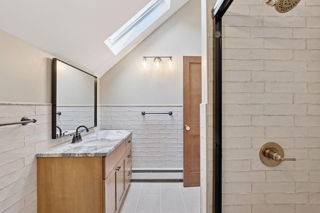 704-706 Holly Ave, Saint Paul, MN 55104 - bathroom with baseboard heating, a skylight, a stall shower, lofted ceiling, and vanity