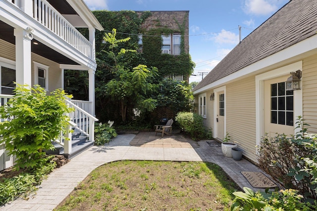 704-706 Holly Ave, Saint Paul, MN 55104 - view of yard featuring a patio area and a balcony