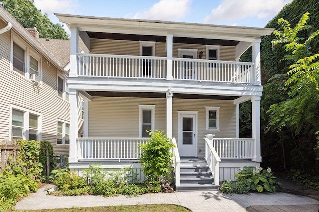 704-706 Holly Ave, Saint Paul, MN 55104 - view of front facade featuring a balcony and a porch
