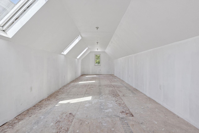 704-706 Holly Ave, Saint Paul, MN 55104 - additional living space featuring a skylight and vaulted ceiling