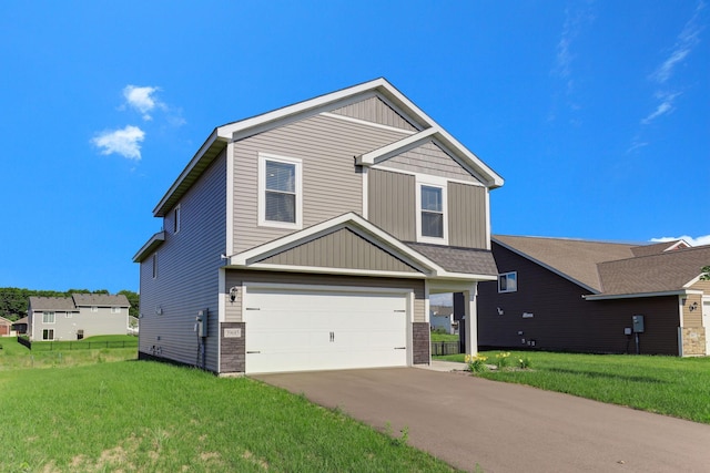 39685 Fallbrook Ave, North Branch, MN 55056 - view of front facade featuring an attached garage, a front lawn, and driveway