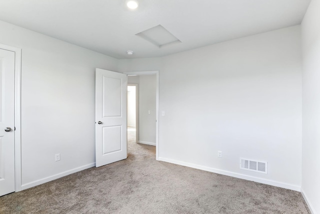 39685 Fallbrook Ave, North Branch, MN 55056 - unfurnished bedroom featuring carpet flooring and attic access