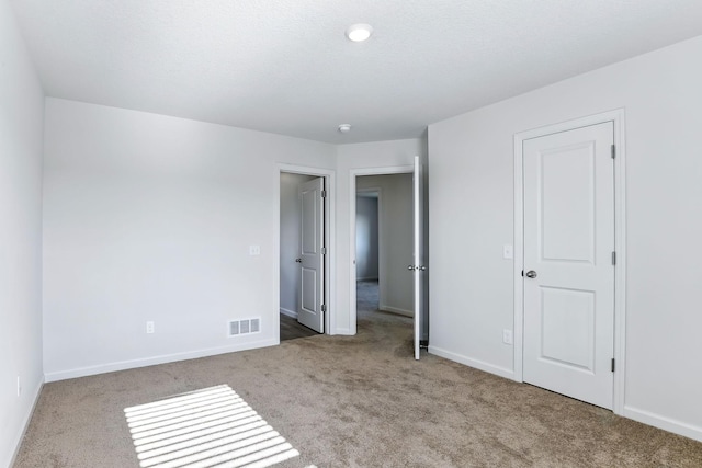 39685 Fallbrook Ave, North Branch, MN 55056 - unfurnished bedroom with carpet flooring and baseboards