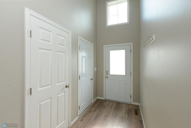 8037 Goldfinch Dr, Horace, ND 58047 - entryway featuring light wood-style flooring and baseboards