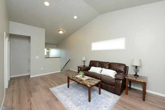 8037 Goldfinch Dr, Horace, ND 58047 - living area featuring lofted ceiling, light wood-type flooring, and recessed lighting