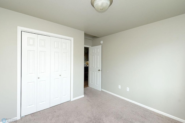 8037 Goldfinch Dr, Horace, ND 58047 - unfurnished bedroom featuring carpet floors and a closet