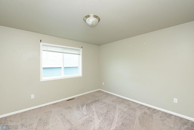 8037 Goldfinch Dr, Horace, ND 58047 - carpeted spare room featuring baseboards