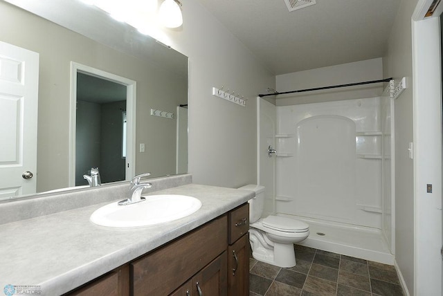 8037 Goldfinch Dr, Horace, ND 58047 - full bathroom with vanity, a shower, and stone finish flooring