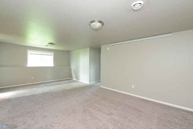 8037 Goldfinch Dr, Horace, ND 58047 - carpeted empty room featuring a smoke detector and a textured ceiling
