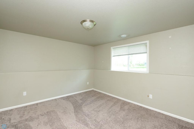 8037 Goldfinch Dr, Horace, ND 58047 - carpeted empty room featuring baseboards and a smoke detector