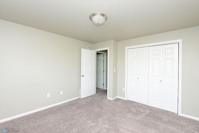 8037 Goldfinch Dr, Horace, ND 58047 - unfurnished bedroom with carpet flooring and a closet
