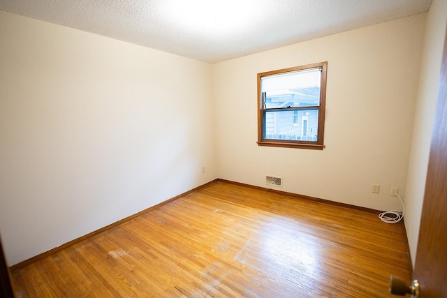 1611 Taylor Ave W, Saint Paul, MN 55104 - empty room featuring light wood-type flooring and baseboards