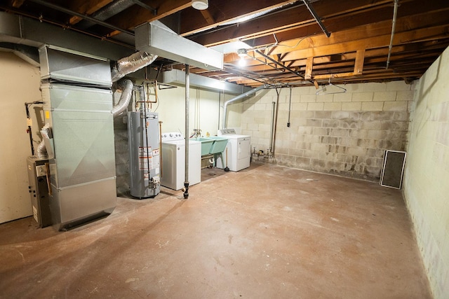 1611 Taylor Ave W, Saint Paul, MN 55104 - unfinished basement with water heater, washing machine and dryer, concrete block wall, and heating unit