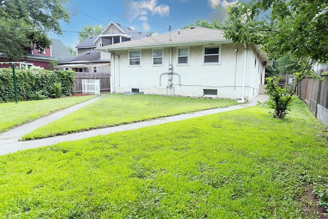 1611 Taylor Ave W, Saint Paul, MN 55104 - back of house with a fenced backyard
