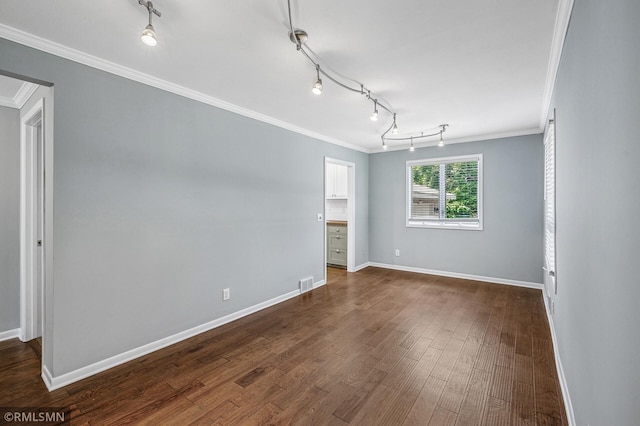 3308 Chippewa Rd, Minnetonka, MN 55305 - unfurnished room featuring rail lighting, dark wood-style floors, and crown molding