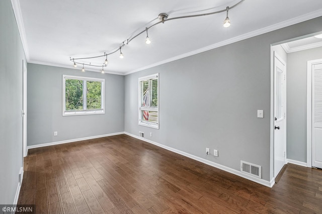 3308 Chippewa Rd, Minnetonka, MN 55305 - spare room featuring ornamental molding, dark wood finished floors, and rail lighting