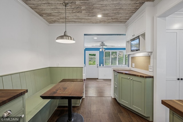 3308 Chippewa Rd, Minnetonka, MN 55305 - unfurnished dining area with ceiling fan, dark wood-style flooring, breakfast area, wainscoting, and wooden ceiling