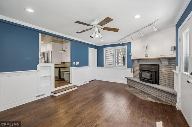 3308 Chippewa Rd, Minnetonka, MN 55305 - unfurnished living room with track lighting, a ceiling fan, dark wood-style floors, recessed lighting, and a wainscoted wall