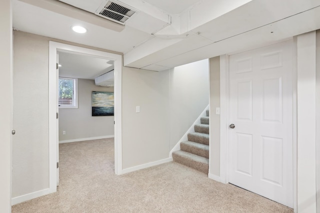 5912 Bartlett Blvd, Mound, MN 55364 - below grade area with light colored carpet, recessed lighting, and stairway