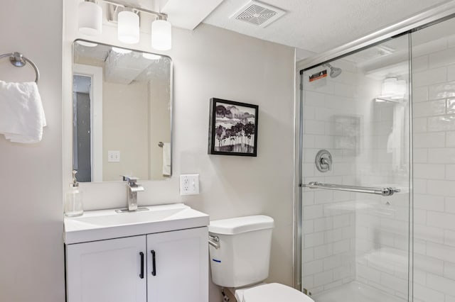 5912 Bartlett Blvd, Mound, MN 55364 - full bathroom featuring vanity, a stall shower, and a textured ceiling