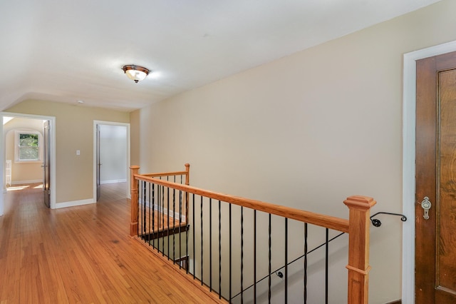4340 Oakland Ave, Minneapolis, MN 55407 - corridor with an upstairs landing and light wood-style floors
