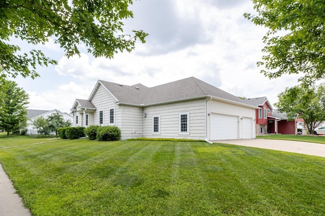 1404 8th St NW, Kasson, MN 55944 - view of property exterior featuring a garage, a lawn, driveway, and roof with shingles