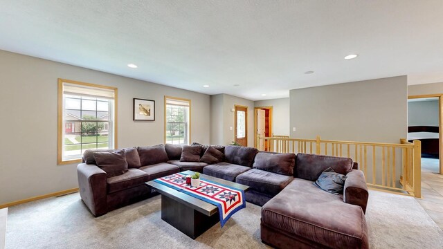 1404 8th St NW, Kasson, MN 55944 - living area with recessed lighting and light carpet