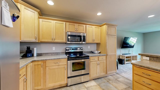 1404 8th St NW, Kasson, MN 55944 - kitchen with appliances with stainless steel finishes, light brown cabinets, and recessed lighting