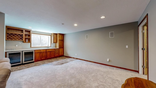 1404 8th St NW, Kasson, MN 55944 - indoor dry bar with wine cooler, light colored carpet, and recessed lighting