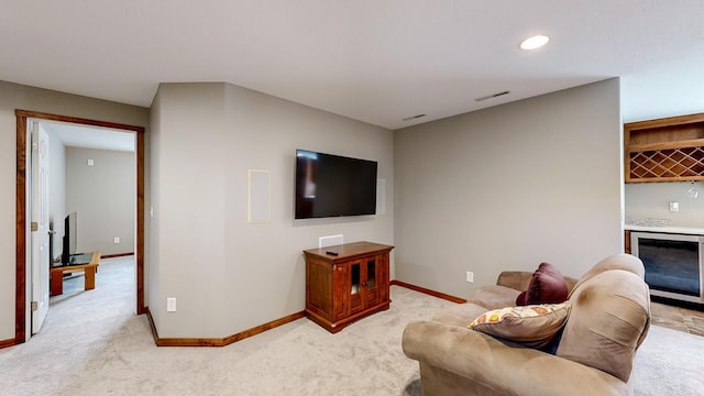 1404 8th St NW, Kasson, MN 55944 - living area with wine cooler, light colored carpet, a bar, and recessed lighting