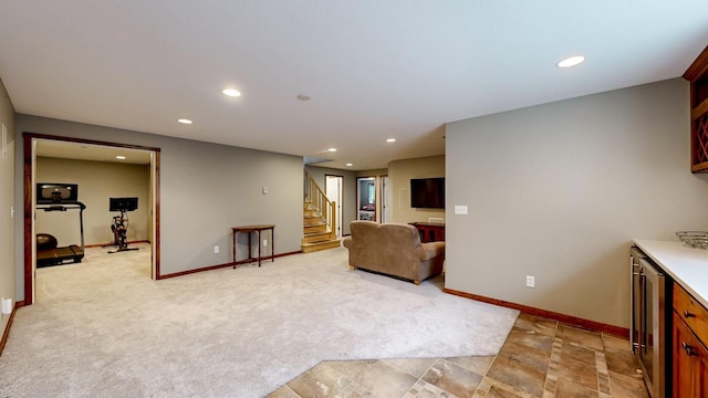 1404 8th St NW, Kasson, MN 55944 - living room with recessed lighting, stairway, and light carpet