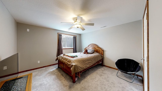 1404 8th St NW, Kasson, MN 55944 - bedroom featuring light carpet, ceiling fan, and a textured ceiling