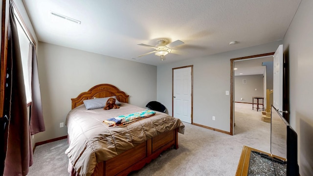 1404 8th St NW, Kasson, MN 55944 - bedroom with light colored carpet and ceiling fan