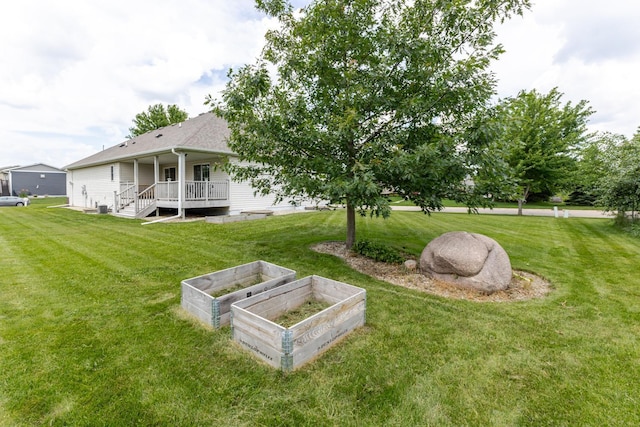 1404 8th St NW, Kasson, MN 55944 - view of green lawn with a garden