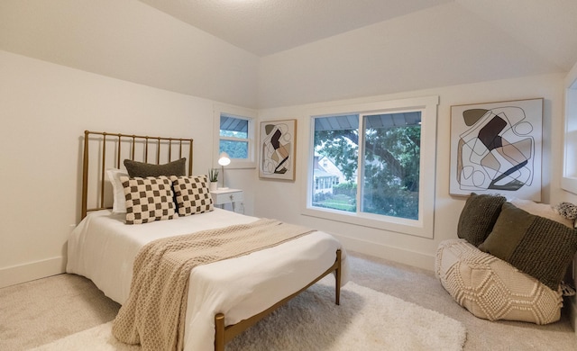 212 Diamond Lake Rd, Minneapolis, MN 55419 - carpeted bedroom featuring lofted ceiling and baseboards