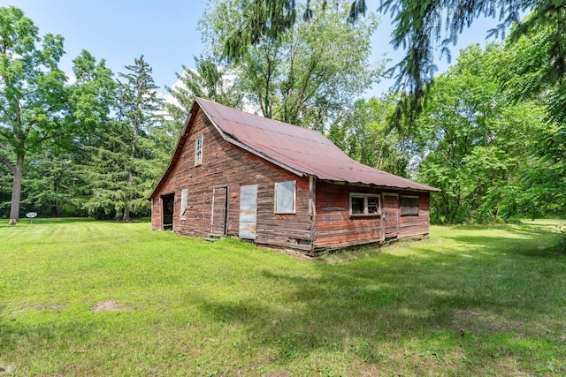 39665 8th Ave, North Branch, MN 55056 - view of home's exterior with a yard and a barn
