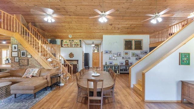 8825 Greeley Loop, Royalton Twp, MN 55006 - dining room with stairs, wood finished floors, ceiling fan, and wood ceiling