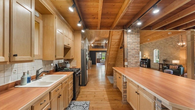 8825 Greeley Loop, Royalton Twp, MN 55006 - kitchen with black range with gas cooktop, a wooden ceiling with exposed beams, light wood-style floors, freestanding refrigerator, and wood counters