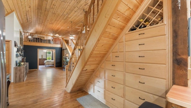 8825 Greeley Loop, Royalton Twp, MN 55006 - stairs featuring wood ceiling, hardwood / wood-style flooring, and vaulted ceiling