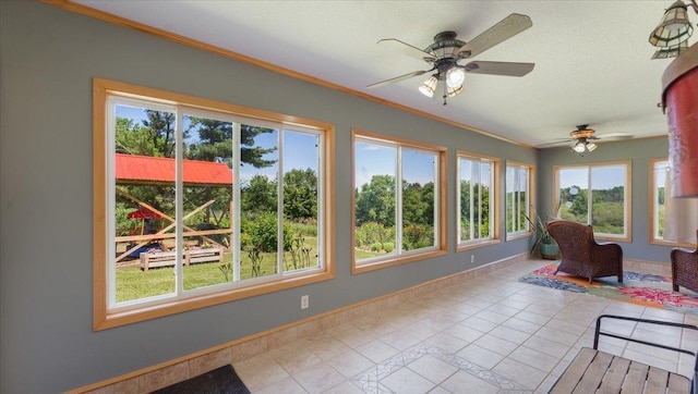 8825 Greeley Loop, Royalton Twp, MN 55006 - sunroom with tile patterned floors and ornamental molding
