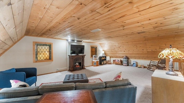 8825 Greeley Loop, Royalton Twp, MN 55006 - living room with carpet, lofted ceiling, wooden ceiling, and a warm lit fireplace