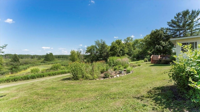 8825 Greeley Loop, Royalton Twp, MN 55006 - view of grassy yard featuring a wooden deck